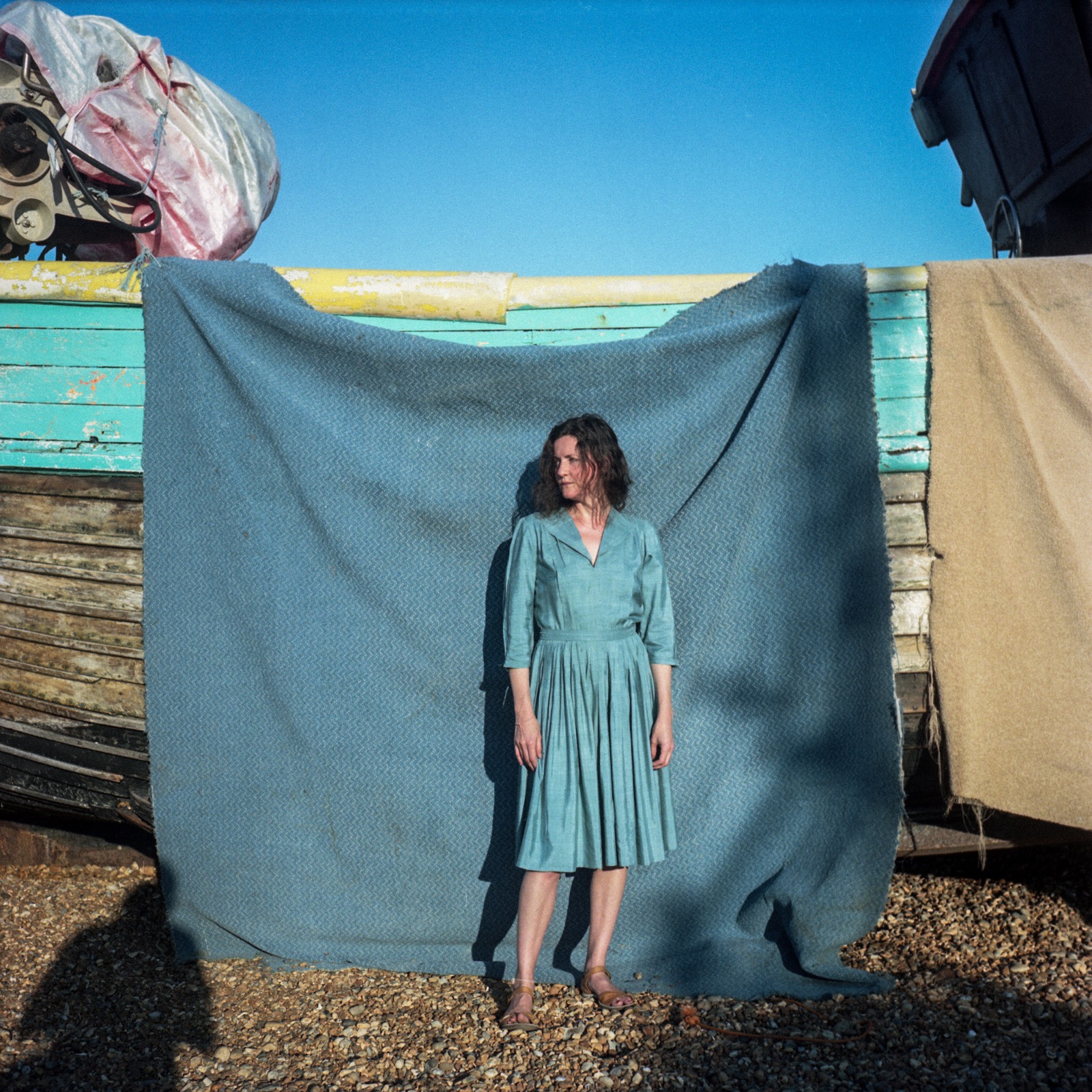 Portrait of woman in blue.