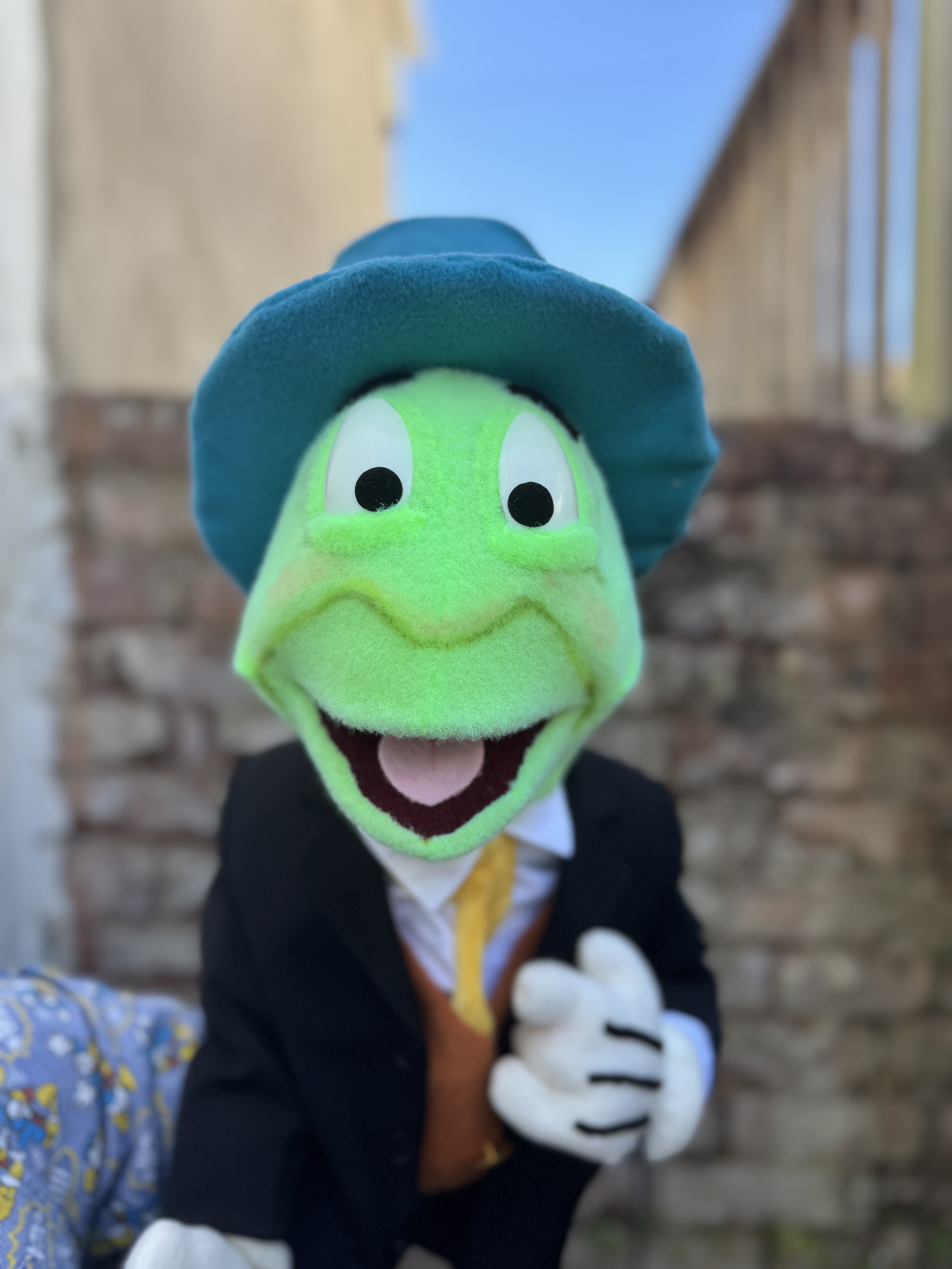 A Jiminy Cricket puppet